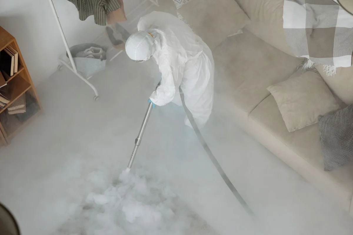 Biohazard cleanup technician in protective equipment, Bermuda Riviera, Fort Lauderdale, FL